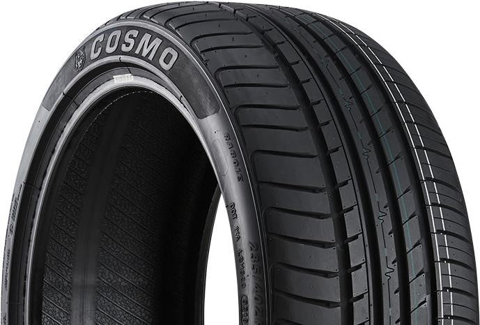Angled close-up of the Cosmo MuchoMacho 235/45R18 tire highlighting the wide shoulder blocks and solid center rib for high-speed grip and cornering stability.