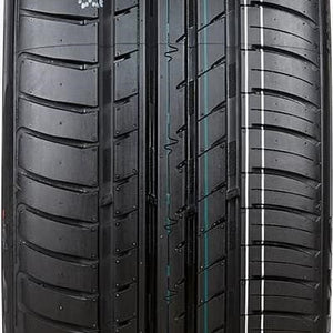 Top-down close-up of the Cosmo MuchoMacho 215/40R17 tread with large outer blocks, circumferential grooves and lateral channels for wet and dry traction.