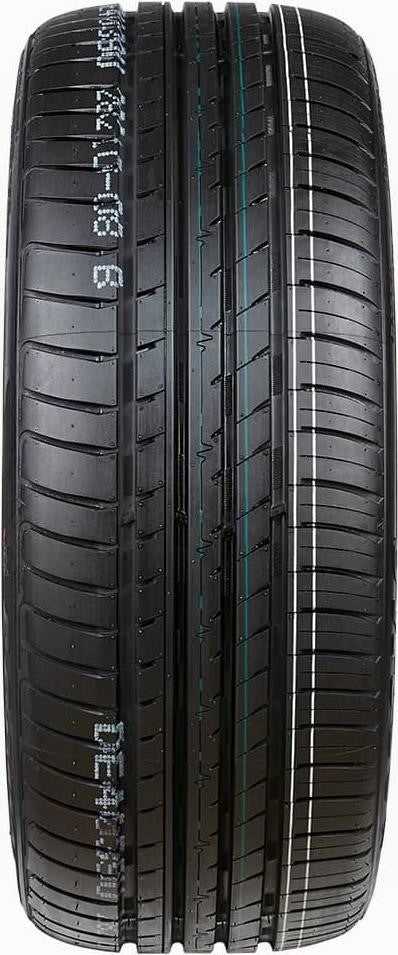 Top-down close-up of the Cosmo MuchoMacho 235/45R18 tread with large outer blocks, circumferential grooves and lateral channels for wet and dry traction.