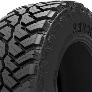 “Angled half-profile of the Cosmo Mud Kicker 33X12.50R22 tire focusing on the shoulder lugs and outer tread blocks for enhanced grip on rough terrain.