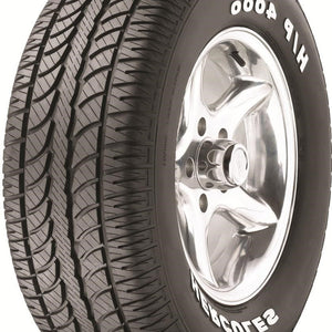 Full side view of Hercules H/P 4000 295/50R15 tire featuring raised white letter sidewall design on white background.