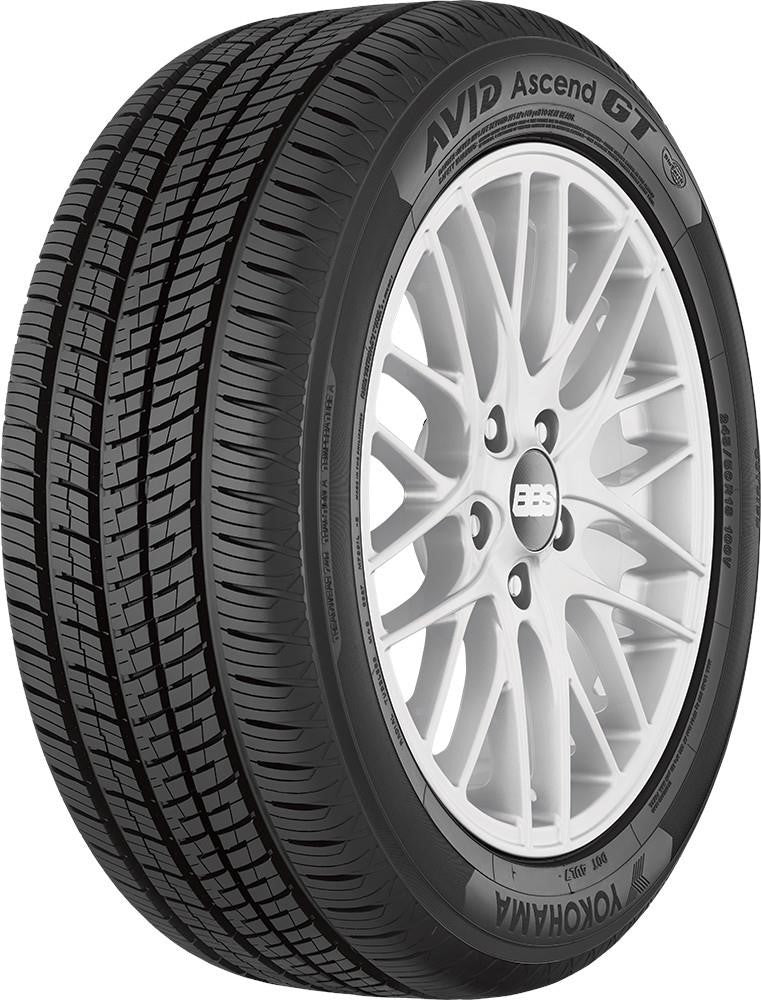 Full side view of Yokohama Avid Ascend GT 215/60R16 all-season touring tire with Yokohama sidewall lettering on white background.